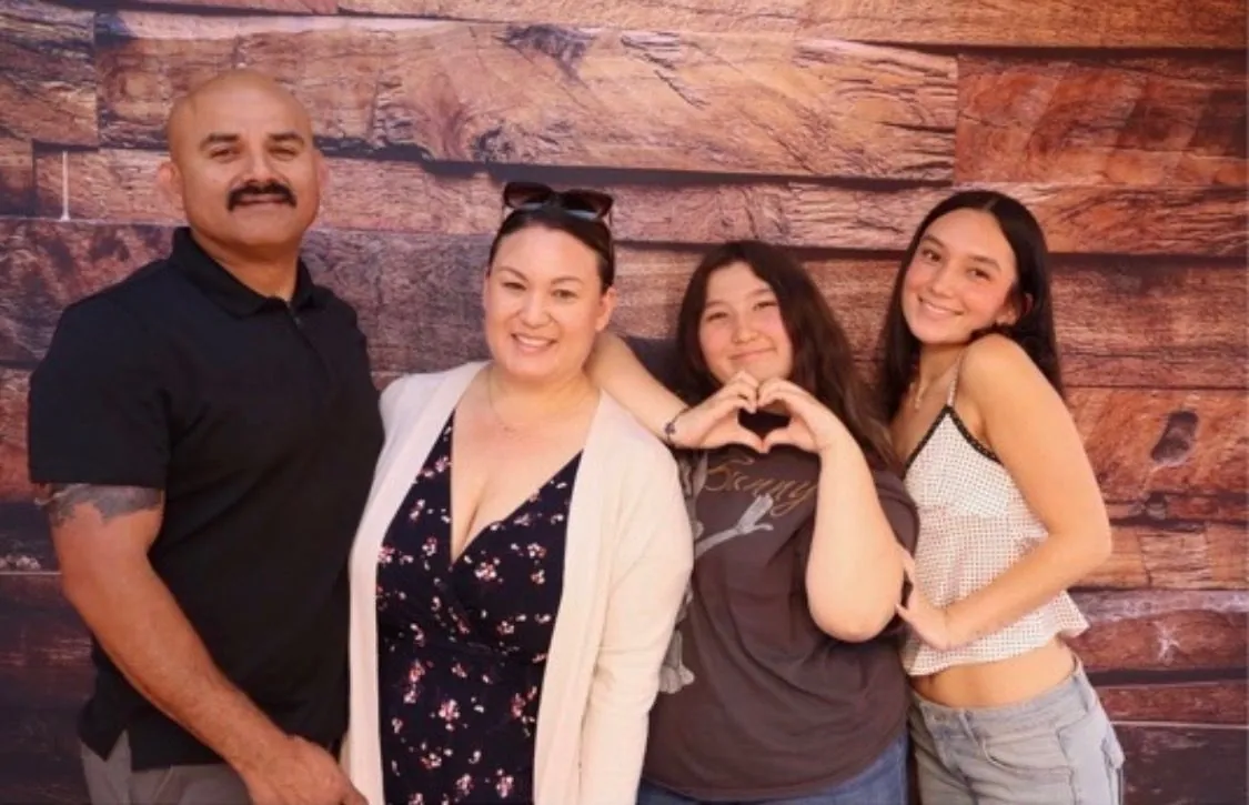 Owner Rene Holguin with his family